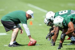 Rex Ryan works with the defensive line during Rookie Mini Camp